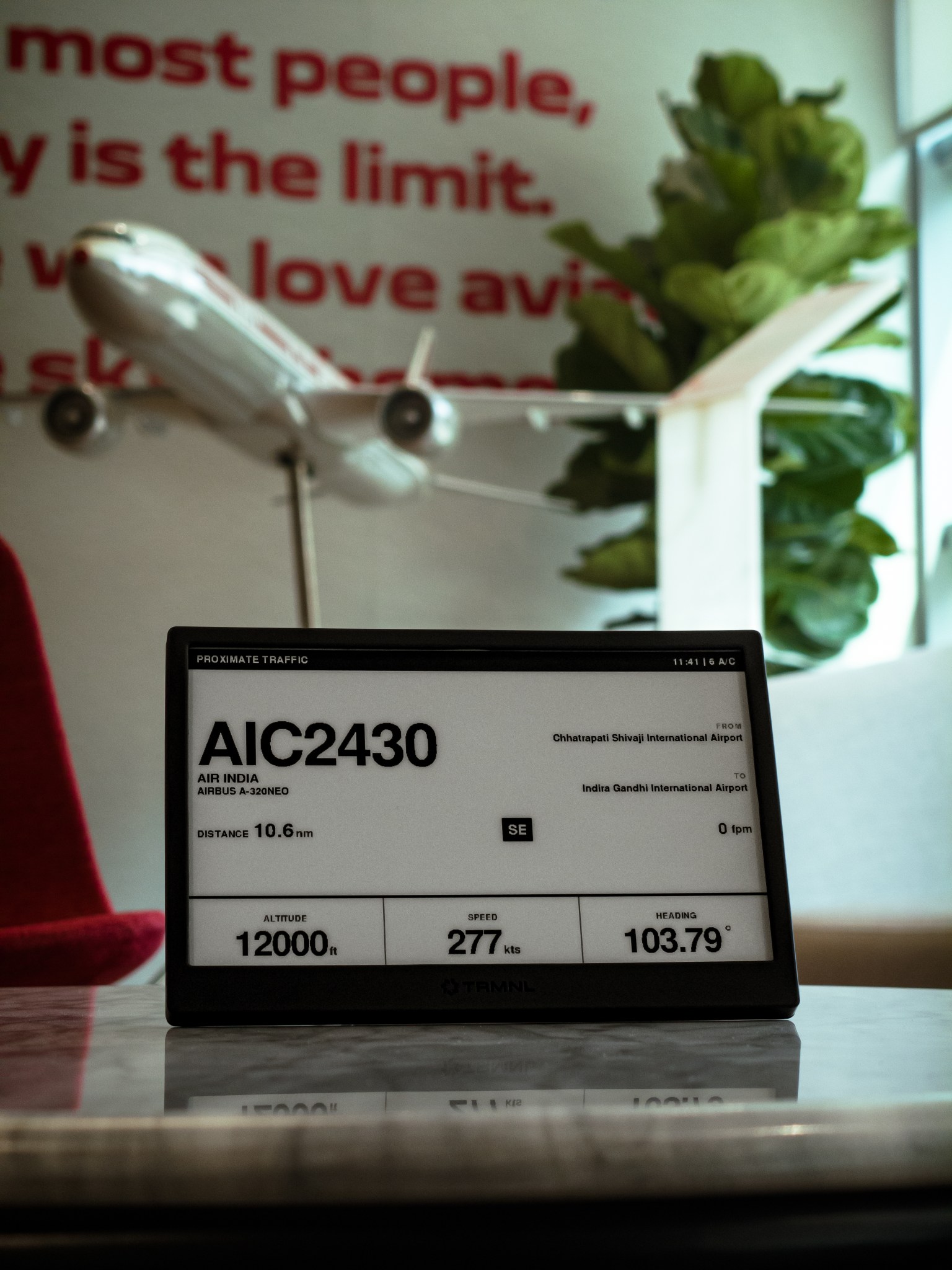 Home 1 TRMNL e-ink display showing live flight data