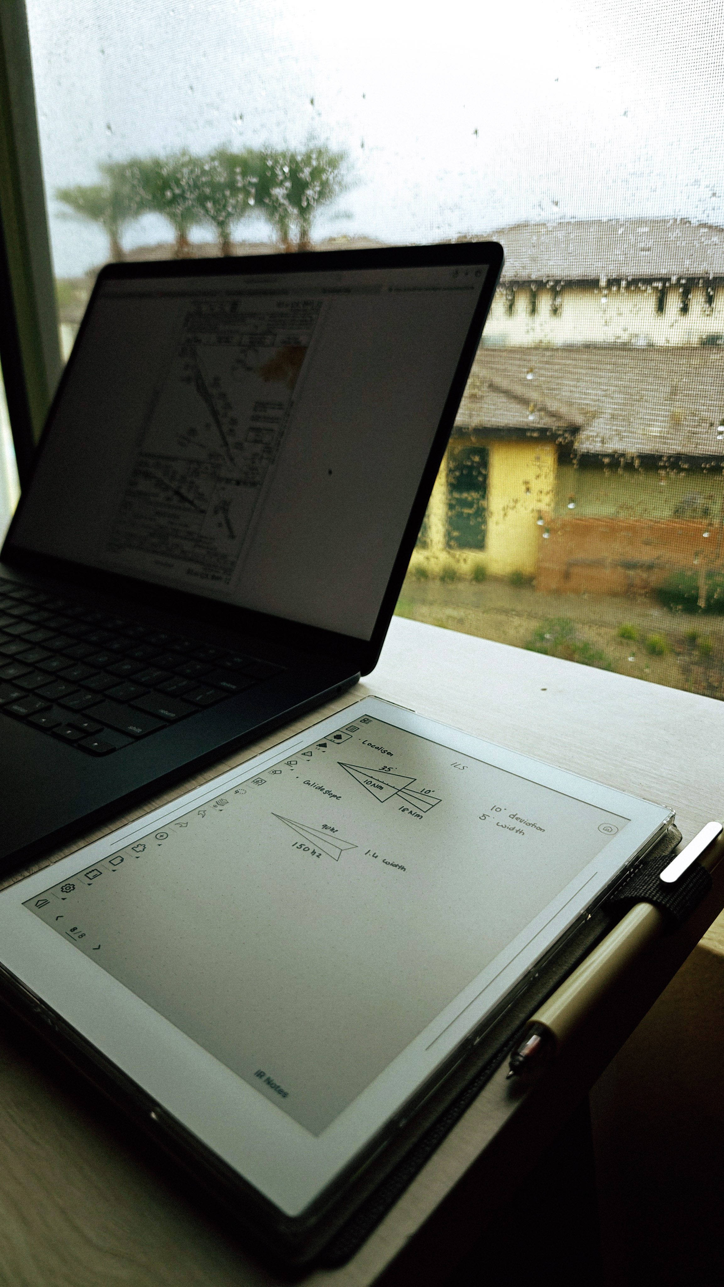 Supernote Nomad with handwritten ILS localizer and glideslope notes beside an approach plate on a Mac